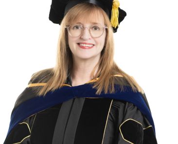 Lea-Ann Germinder in Doctoral Regalia